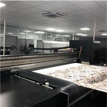What is the pre-treatment of textiles before digital printing?